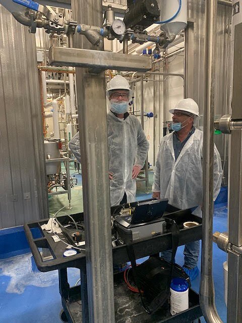 Rust technicians working in cleanroom gear in the 2000s
